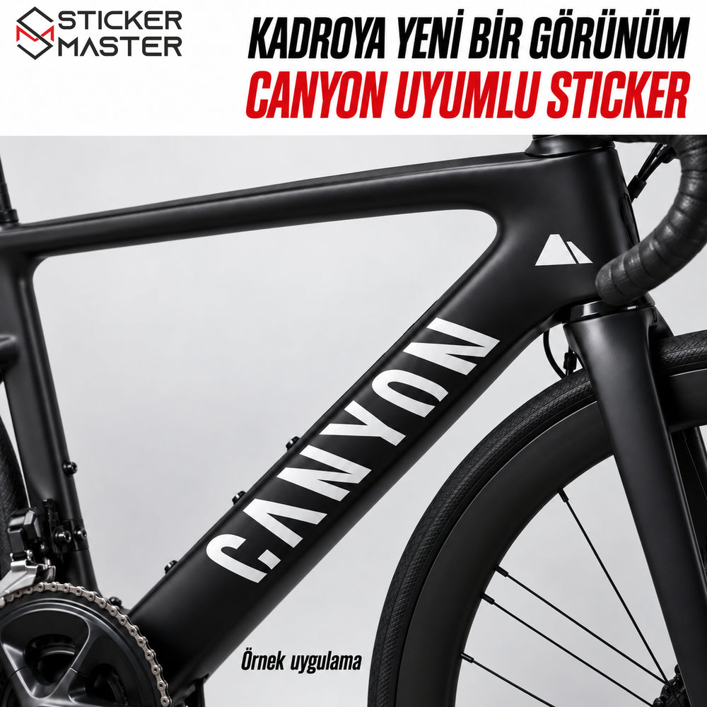 Beyaz Canyon uyumlu logo stickerın siyah bisiklet kadrosunda örnek uygulaması