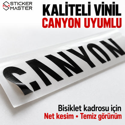 Kaliteli siyah vinilden üretilen Canyon uyumlu logo stickerın yakın plan detayı